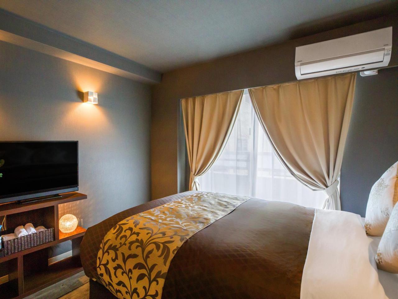 Mr. Kinjo in Gusuku Aparthotel Okinawa Bagian luar foto